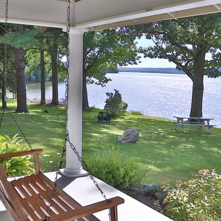 Porch swing overlooking Otsego Lake