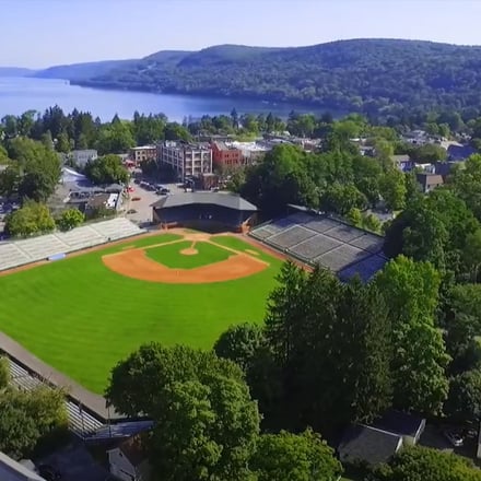 Aerial view of Cooperstown village, baseball field, and Otsego Lake