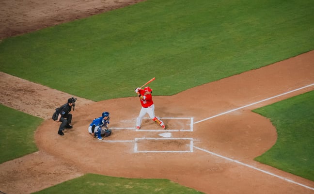 Youth baseball game in progress, batter at the plate